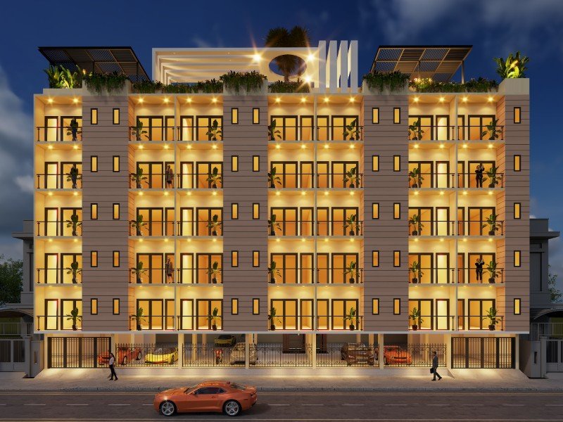 Yashoda Heights illuminated facade at night